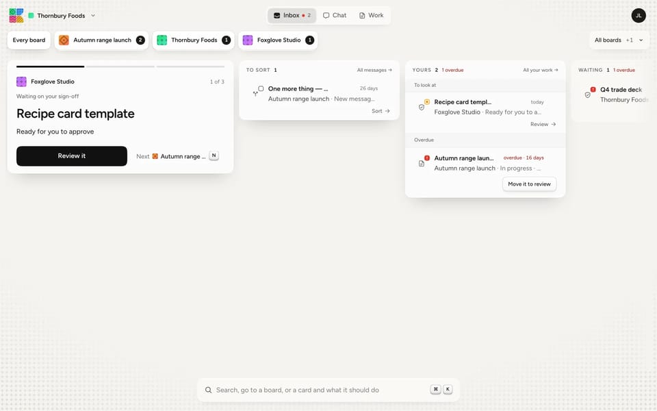Koati's new layout: Inbox, Chat and Work across the top, board pills under them, and the day as modules on a desk